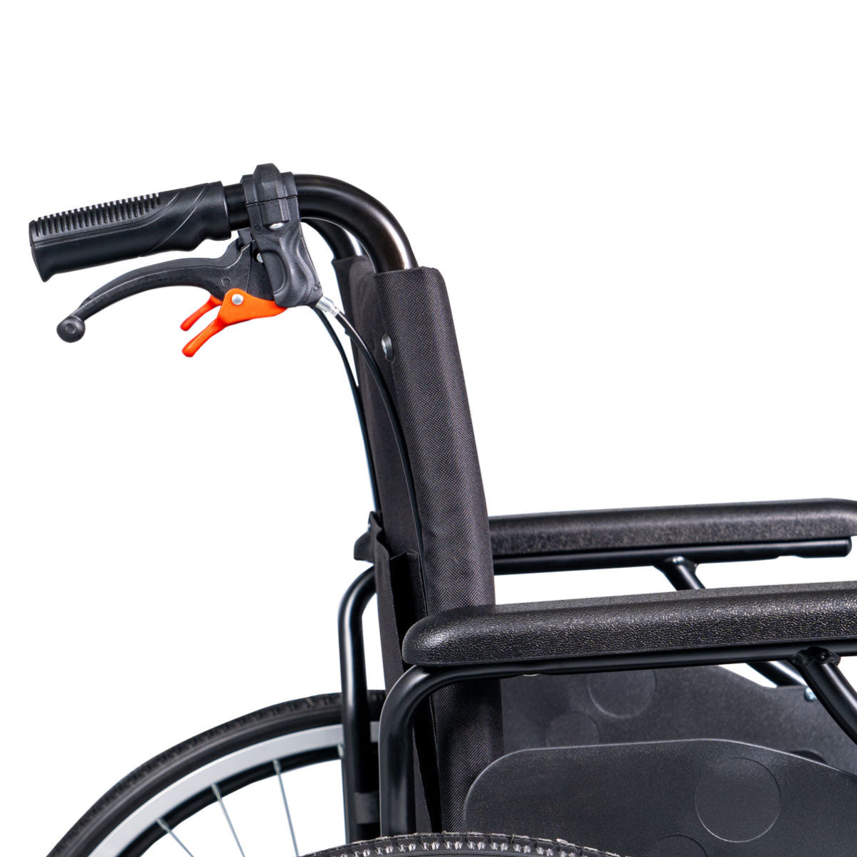 Close-up of a wheelchair with orange brake lever on a white background